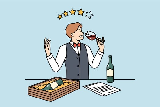 Man sommelier drinks wine from glass and gives rating out of 4 stars for drink with less than ideal taste. Sommelier tastes premium alcohol to choose best bordeaux for restaurant menu