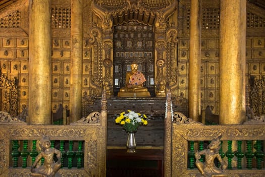Interior of the 19th century Shwe Nandew Buddhist Monastery in Amarapura near Mandalay in Myanmar (Burma).