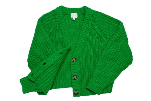 Casual elegant fluffy long-sleeved cardigan with V-neck and button closure isolated on a white background. Womens green sweater or jumper. Autumn and winter fashion.