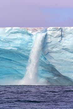 Dramatic Supraglacial River and Waterfall on Nordaustlandet Island in the Svalbard Islands