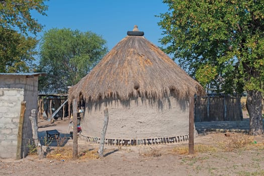 Typical Round Mud Hut in a Village in teh Okavango Delta in Botswana