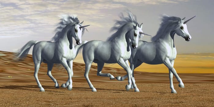 Three white unicorns with flowing manes gallop together in a desert wilderness.