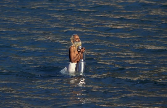 a Holy men and Street Sadhus at the Holy Ganges River in the city of Rishikesh in the Province Uttarakhand in India.  India, Rishikesh, February, 1998