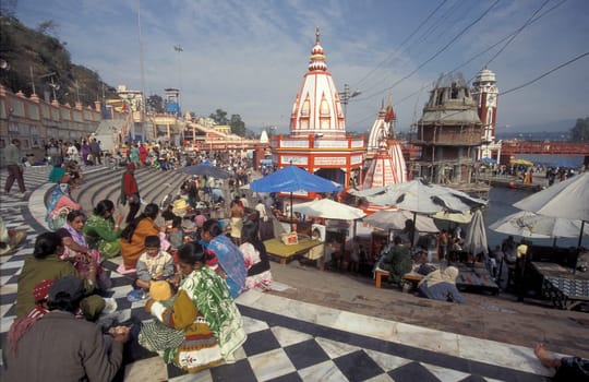 a view over public aerea with the Clock Tower at the Holy Ganges River in the city of Haridwar in the Province Uttarakhand in India.  India, Haridwar, February, 1998