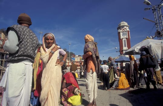a view over public aerea with the Clock Tower at the Holy Ganges River in the city of Haridwar in the Province Uttarakhand in India.  India, Haridwar, February, 1998