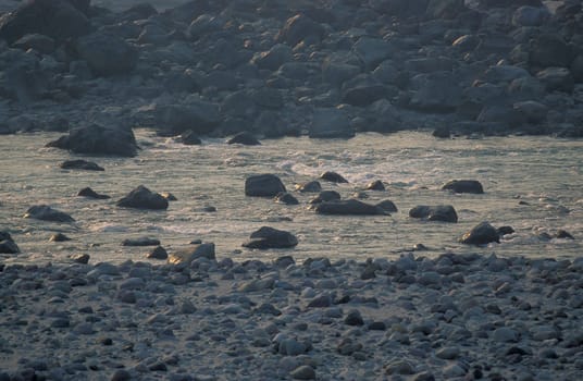 the Holy Ganges River in the city of Rishikesh in the Province Uttarakhand in India.  India, Rishikesh, February, 1998