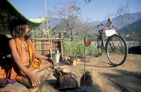 a Holy men and Street Sadhus at the Holy Ganges River in the city of Rishikesh in the Province Uttarakhand in India.  India, Rishikesh, February, 1998