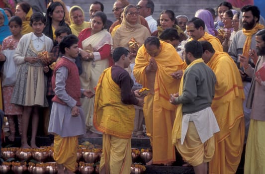 Hindi Pilgrim at a ceremony at the Holy Ganges River in the city of Haridwar in the Province Uttarakhand in India.  India, Haridwar, February, 1998
