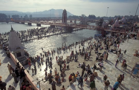 a view over public aerea with the Clock Tower at the Holy Ganges River in the city of Haridwar in the Province Uttarakhand in India.  India, Haridwar, February, 1998