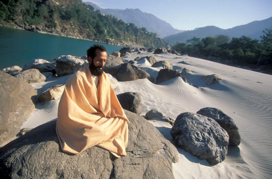 a Holy men and Street Sadhus at the Holy Ganges River in the city of Rishikesh in the Province Uttarakhand in India.  India, Rishikesh, February, 1998