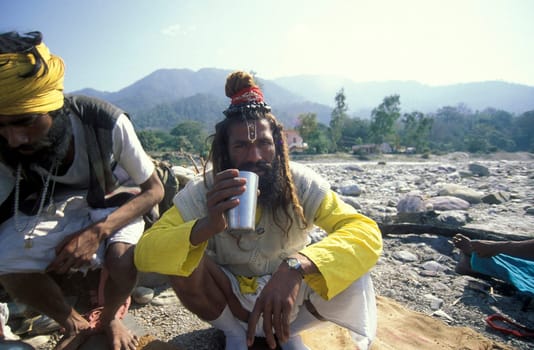 a Holy men and Street Sadhus at the Holy Ganges River in the city of Rishikesh in the Province Uttarakhand in India.  India, Rishikesh, February, 1998
