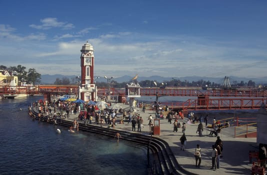 a view over public aerea with the Clock Tower at the Holy Ganges River in the city of Haridwar in the Province Uttarakhand in India.  India, Haridwar, February, 1998