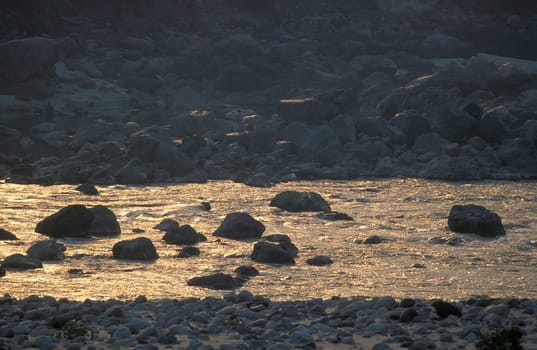 the Holy Ganges River in the city of Rishikesh in the Province Uttarakhand in India.  India, Rishikesh, February, 1998