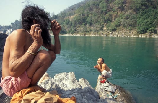 a Holy men and Street Sadhus at the Holy Ganges River in the city of Rishikesh in the Province Uttarakhand in India.  India, Rishikesh, February, 1998