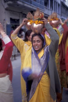 Hindi Pilgrim at a ceremony at the Holy Ganges River in the city of Haridwar in the Province Uttarakhand in India.  India, Haridwar, February, 1998