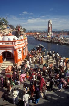 a view over public aerea with the Clock Tower at the Holy Ganges River in the city of Haridwar in the Province Uttarakhand in India.  India, Haridwar, February, 1998