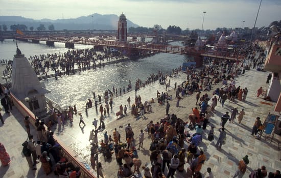 a view over public aerea with the Clock Tower at the Holy Ganges River in the city of Haridwar in the Province Uttarakhand in India.  India, Haridwar, February, 1998