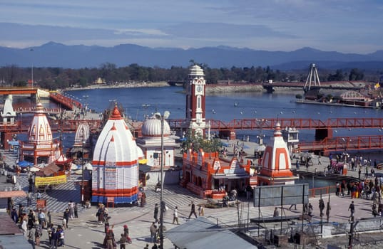 a view over public aerea with the Clock Tower at the Holy Ganges River in the city of Haridwar in the Province Uttarakhand in India.  India, Haridwar, February, 1998