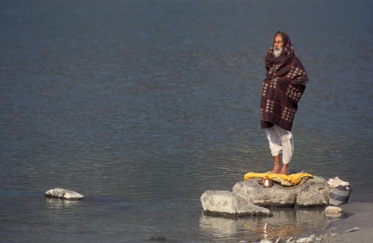 a Holy men and Street Sadhus at the Holy Ganges River in the city of Rishikesh in the Province Uttarakhand in India.  India, Rishikesh, February, 1998