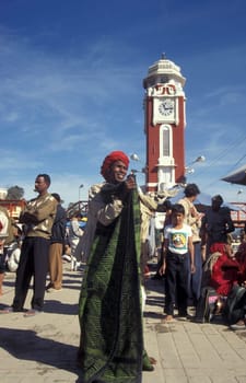 a view over public aerea with the Clock Tower at the Holy Ganges River in the city of Haridwar in the Province Uttarakhand in India.  India, Haridwar, February, 1998