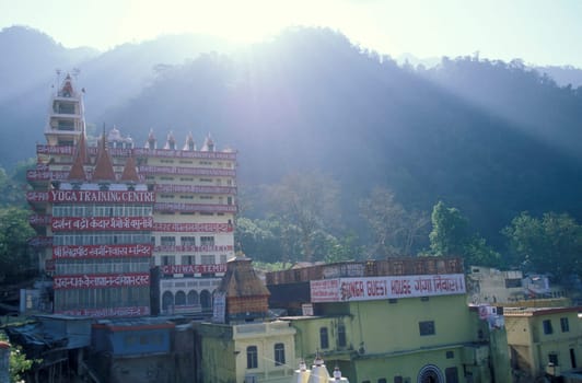 a Hindu Hermitage or Monastery of Ashram at the Holy Ganges River in the city of Rishikesh in the Province Uttarakhand in India.  India, Rishikesh, February, 1998