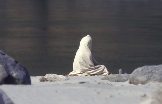 a Holy men and Street Sadhus at the Holy Ganges River in the city of Rishikesh in the Province Uttarakhand in India.  India, Rishikesh, February, 1998