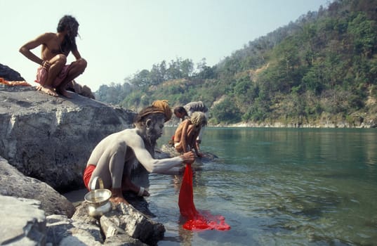 a Holy men and Street Sadhus at the Holy Ganges River in the city of Rishikesh in the Province Uttarakhand in India.  India, Rishikesh, February, 1998