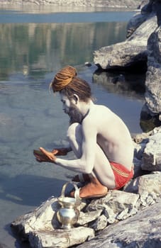 a Holy men and Street Sadhus at the Holy Ganges River in the city of Rishikesh in the Province Uttarakhand in India.  India, Rishikesh, February, 1998