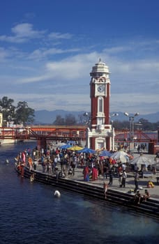 a view over public aerea with the Clock Tower at the Holy Ganges River in the city of Haridwar in the Province Uttarakhand in India.  India, Haridwar, February, 1998