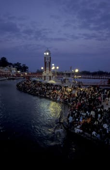 a view over public aerea with the Clock Tower at the Holy Ganges River in the city of Haridwar in the Province Uttarakhand in India.  India, Haridwar, February, 1998