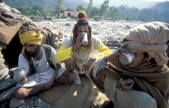 a Holy men and Street Sadhus at the Holy Ganges River in the city of Rishikesh in the Province Uttarakhand in India.  India, Rishikesh, February, 1998