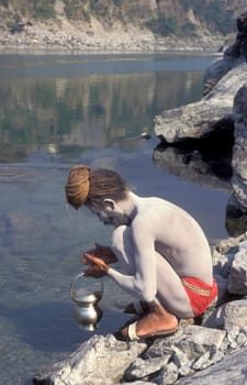 a Holy men and Street Sadhus at the Holy Ganges River in the city of Rishikesh in the Province Uttarakhand in India.  India, Rishikesh, February, 1998