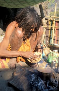a Holy men and Street Sadhus at the Holy Ganges River in the city of Rishikesh in the Province Uttarakhand in India.  India, Rishikesh, February, 1998