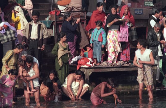 Hindi Pilgrim take a Bath in the Ganges River in the city of Haridwar in the Province Uttarakhand in India.  India, Haridwar, February, 1998