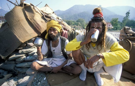 a Holy men and Street Sadhus at the Holy Ganges River in the city of Rishikesh in the Province Uttarakhand in India.  India, Rishikesh, February, 1998