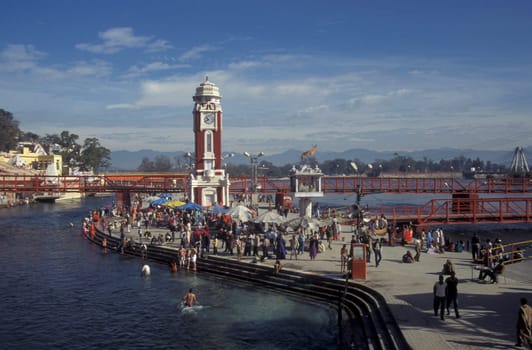 Hindi Pilgrim take a Bath in the Ganges River in the city of Haridwar in the Province Uttarakhand in India.  India, Haridwar, February, 1998