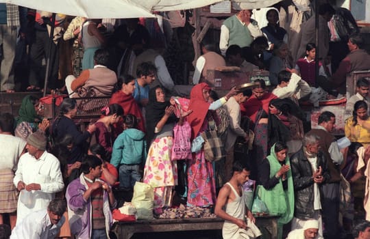 Hindi Pilgrim on a ceremony at the Ganges River in the city of Haridwar in the Province Uttarakhand in India.  India, Haridwar, February, 1998