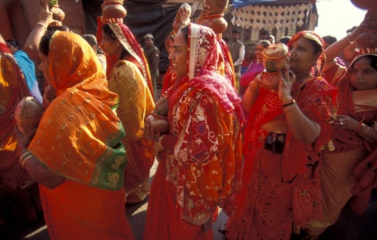 Hindi Pilgrim at a ceremony at the Holy Ganges River in the city of Haridwar in the Province Uttarakhand in India.  India, Haridwar, February, 1998