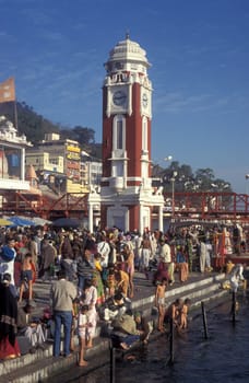 a view over public aerea with the Clock Tower at the Holy Ganges River in the city of Haridwar in the Province Uttarakhand in India.  India, Haridwar, February, 1998