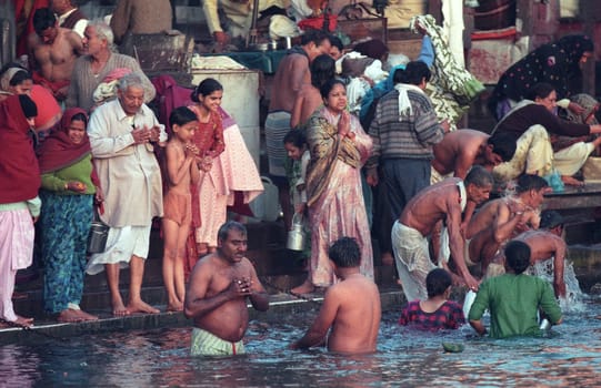 Hindi Pilgrim take a Bath in the Ganges River in the city of Haridwar in the Province Uttarakhand in India.  India, Haridwar, February, 1998