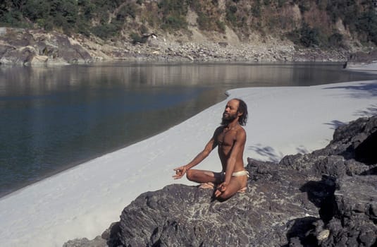 a Holy men and Street Sadhus at the Holy Ganges River in the city of Rishikesh in the Province Uttarakhand in India.  India, Rishikesh, February, 1998