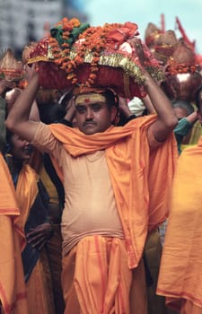 Hindi Pilgrim at a ceremony at the Holy Ganges River in the city of Haridwar in the Province Uttarakhand in India.  India, Haridwar, February, 1998