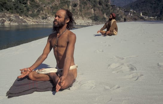 a Holy men and Street Sadhus at the Holy Ganges River in the city of Rishikesh in the Province Uttarakhand in India.  India, Rishikesh, February, 1998