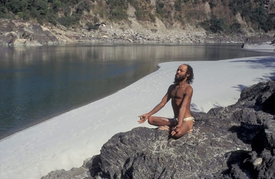 a Holy men and Street Sadhus at the Holy Ganges River in the city of Rishikesh in the Province Uttarakhand in India.  India, Rishikesh, February, 1998