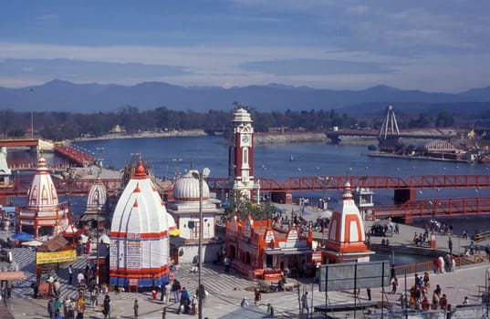 a view over public aerea with the Clock Tower at the Holy Ganges River in the city of Haridwar in the Province Uttarakhand in India.  India, Haridwar, February, 1998