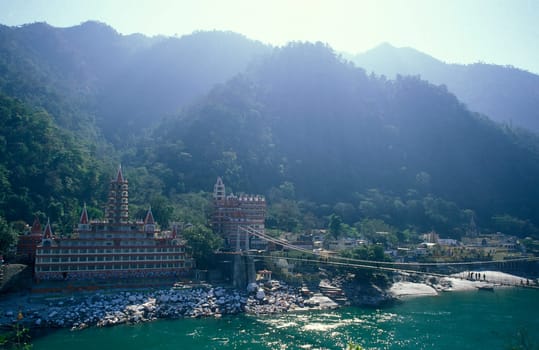 a Hindu Hermitage or Monastery of Ashram at the Holy Ganges River in the city of Rishikesh in the Province Uttarakhand in India.  India, Rishikesh, February, 1998