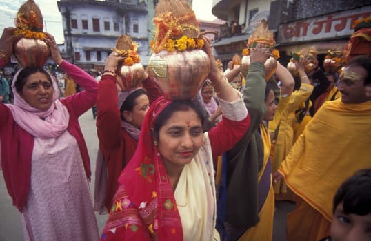 Hindi Pilgrim at a ceremony at the Holy Ganges River in the city of Haridwar in the Province Uttarakhand in India.  India, Haridwar, February, 1998