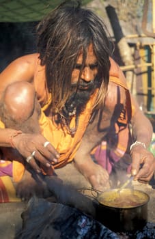 a Holy men and Street Sadhus at the Holy Ganges River in the city of Rishikesh in the Province Uttarakhand in India.  India, Rishikesh, February, 1998