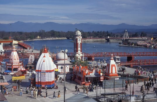 a view over public aerea with the Clock Tower at the Holy Ganges River in the city of Haridwar in the Province Uttarakhand in India.  India, Haridwar, February, 1998