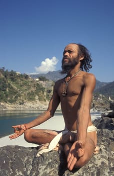a Holy men and Street Sadhus at the Holy Ganges River in the city of Rishikesh in the Province Uttarakhand in India.  India, Rishikesh, February, 1998